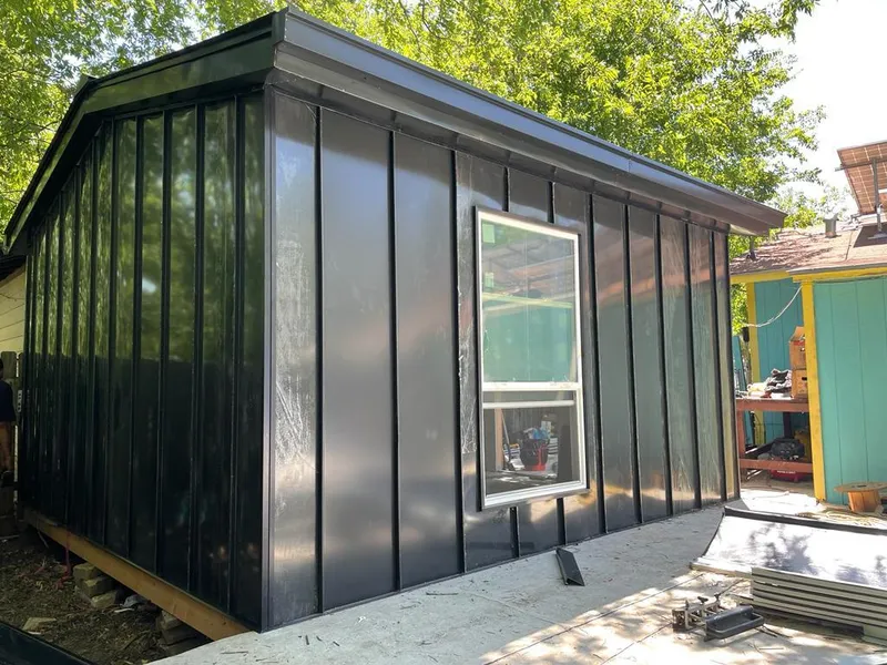 Black standing seam metal wall panels for Metal Roof Installation in Johnsburg