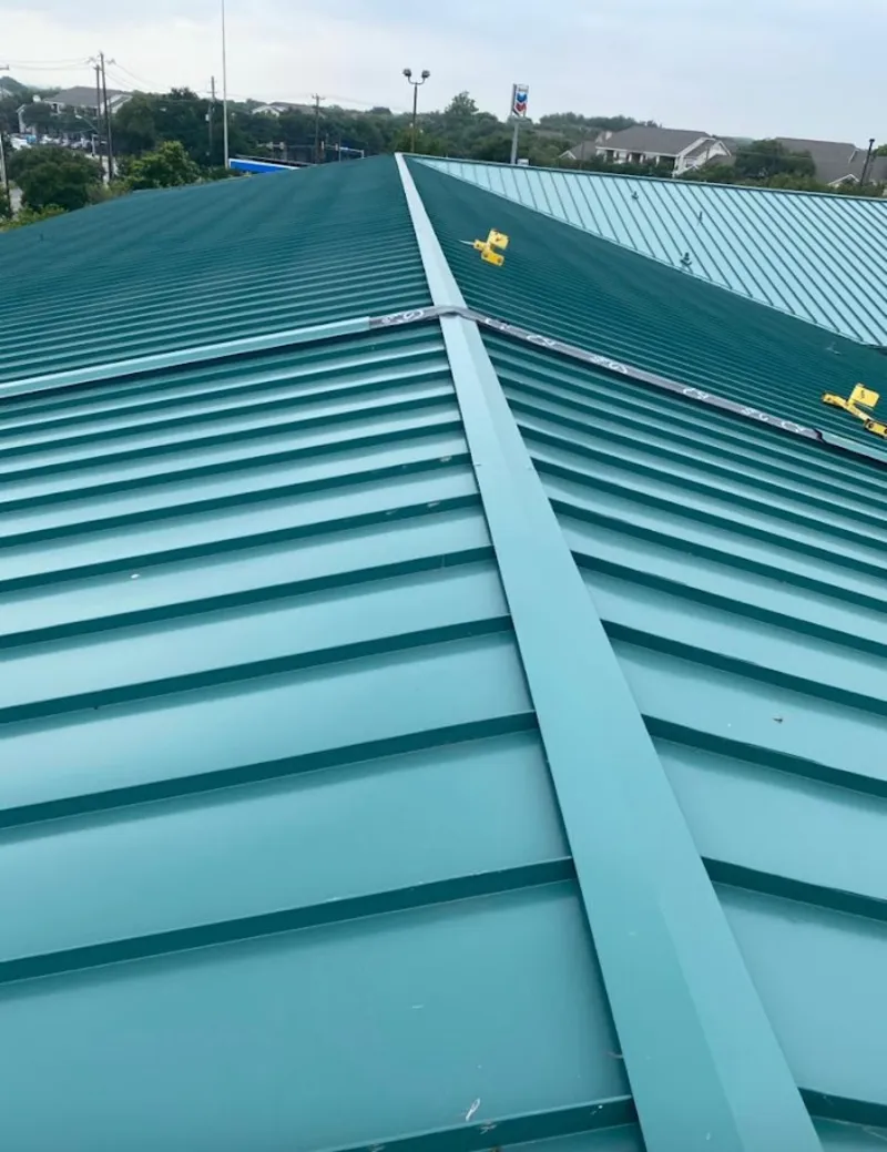 Green commercial metal roof ridge and valley for Metal Roof Repair in Johnsburg