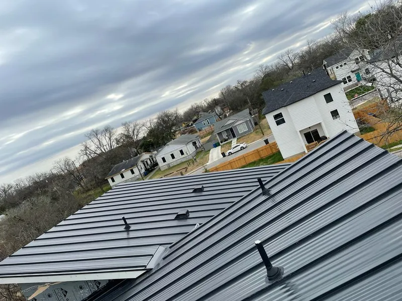 Standing seam metal roof panels with vents for Skylight Repair in Johnsburg